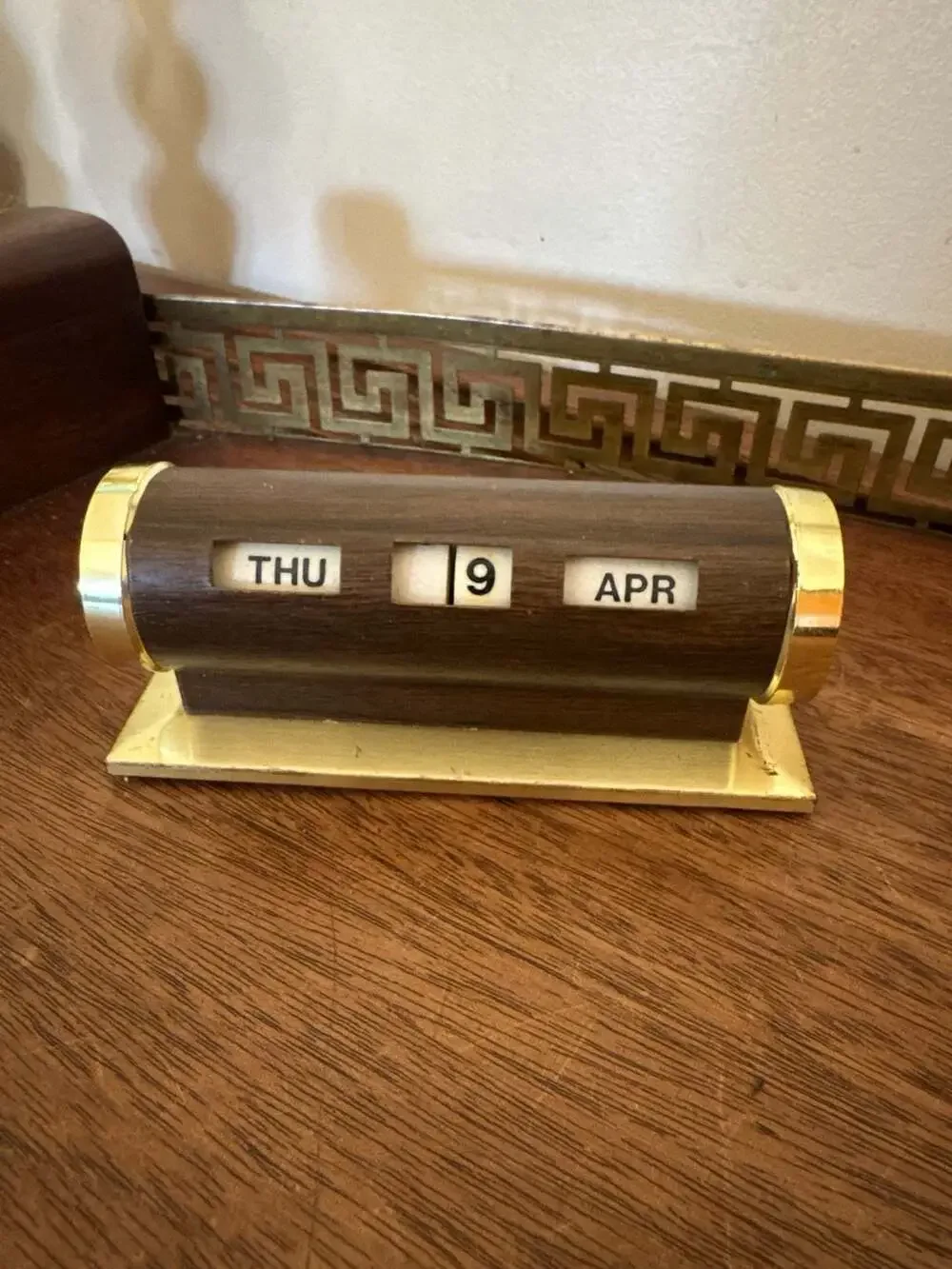 Vintage Mid Century Brass and Faux Wood Cylindrical Perpetual Desk Calendar